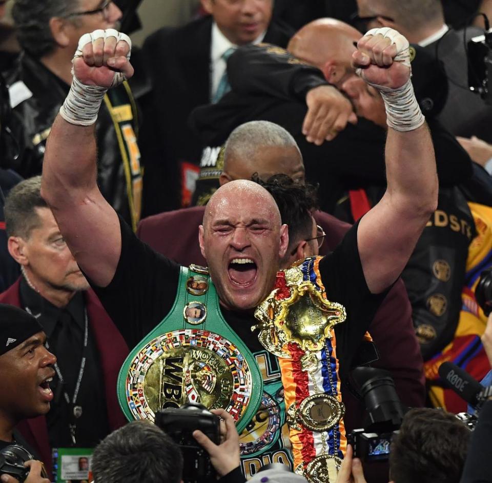 Tyson Fury celebrates after his victory over Deontay Wilder