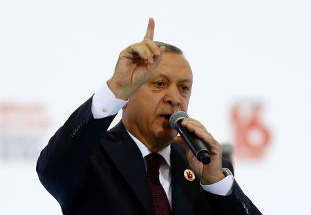 Turkish President Tayyip Erdogan makes a speech during a ceremony to mark the 16th anniversary of his ruling AK Party's foundation in Ankara, Turkey, August 14, 2017. REUTERS/Umit Bektas