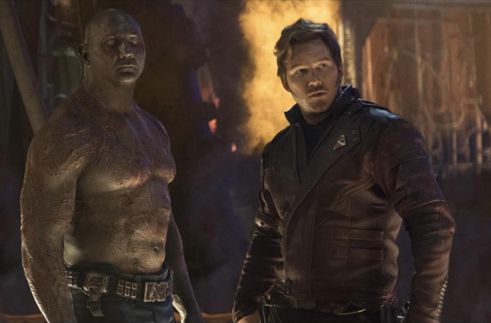 Drax (Dave Bautista) and Star-Lord (Chris Pratt) assess the damage of the Thanos-trashed Knowhere in <em>Infinity War</em>. (Photo: Marvel Studios)