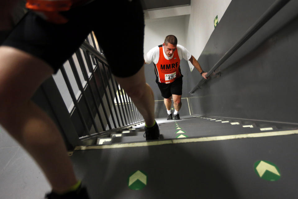 Participants make their way up the stairs during the Empire State Building Run-Up on Wednesday, Feb. 5, 2014, in New York. (AP Photo/Jason DeCrow)