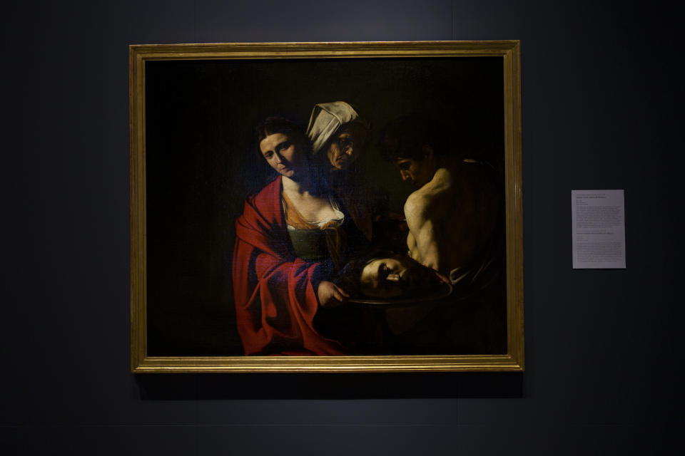 A painting called "Salome with the Head of John the Baptist", by Caravaggio is displayed at the Royal Collections Gallery in Madrid, Spain, Friday, May. 19, 2023. Spain is set to unveil what is touted as one of Europe’s cultural highlights of the year with the opening in Madrid of The Royal Collections Gallery next month. (AP Photo/Manu Fernandez)