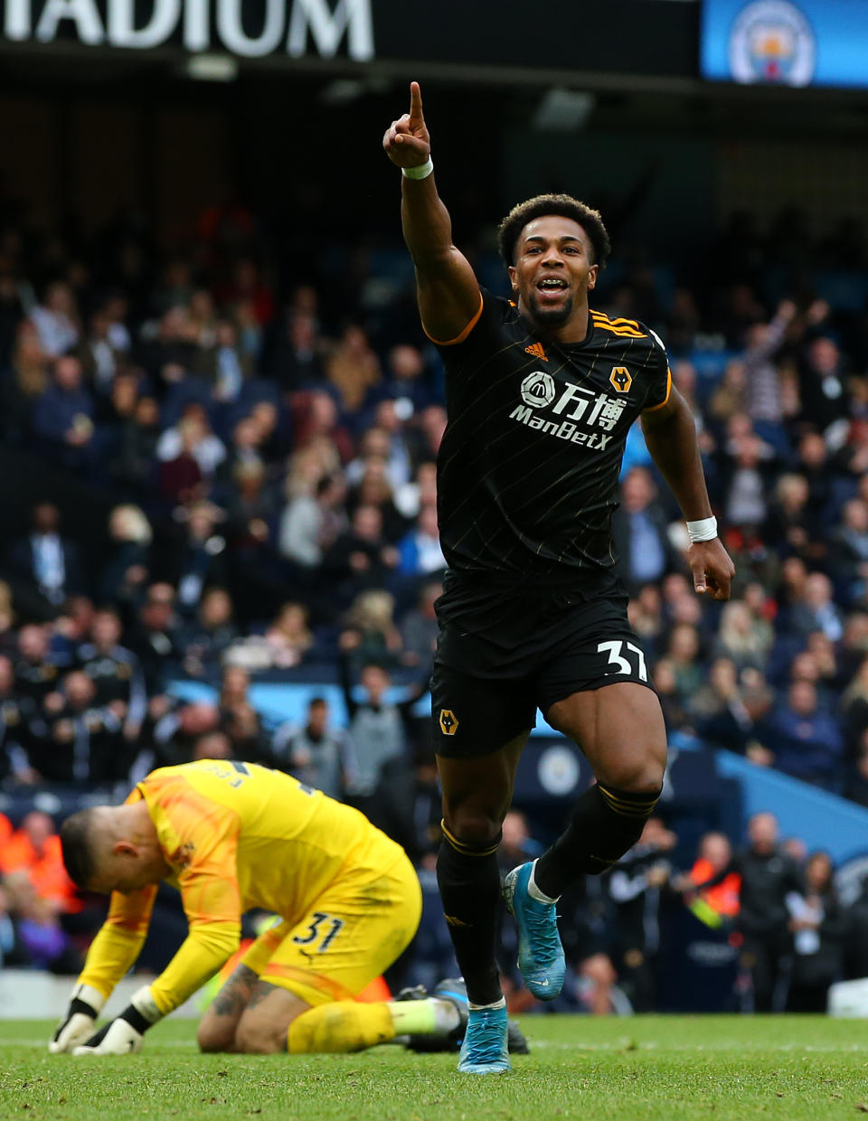 MANCHESTER, ENGLAND - OCTOBER 06:  Adama Traore of Wolverhampton Wanderers celebrates after scoring his team's first goal during the Premier League match between Manchester City and Wolverhampton Wanderers at Etihad Stadium on October 06, 2019 in Manchester, United Kingdom. (Photo by Alex Livesey/Getty Images)