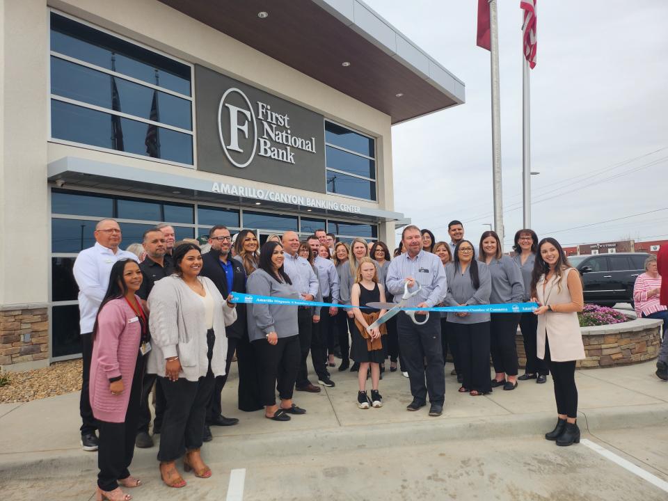 The Amarillo Hispanic Chamber of Commerce commemorates the grand opening of the First National Bank Amarillo/Canyon location with a ribbon cutting ceremony Thursday.