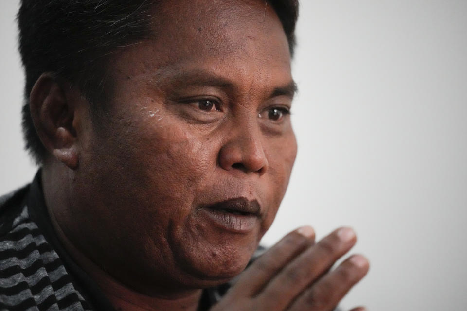 Filipino fishermen Joely Saligan talks to reporters during an interview in Manila, Philippines on Tuesday, Jan. 23, 2024. A Filipino fishing boat captain said Tuesday that he asserted Philippine sovereign rights in a tense confrontation with Chinese authorities in the disputed South China Sea in a new spat that is testing efforts by Beijing and Manila to deescalate tensions in a potential Asian flashpoint. (AP Photo/Aaron Favila)