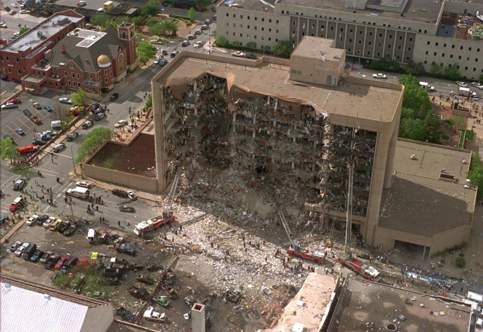 FILE - In this April 19, 1995, file photo, the north side of the Alfred P. Murrah Federal Building in Oklahoma City is missing after a vehicle bombing which killed 168 people. The Oklahoma City National Memorial and Museum has scaled back its plans for a 25th anniversary remembrance amid the coronavirus outbreak and will instead offer a recorded, one-hour television program that includes the reading of the names of the 168 people killed in the bombing followed by 168 seconds of silence. (AP Photo, File)