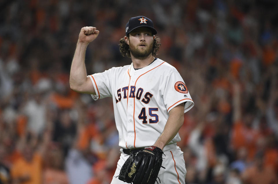Houston Astros starting pitcher Gerrit Cole (45) reacts after an out against the Tampa Bay Rays during the seventh inning of Game 5 of a baseball American League Division Series in Houston, Thursday, Oct. 10, 2019. (AP Photo/Eric Christian Smith)