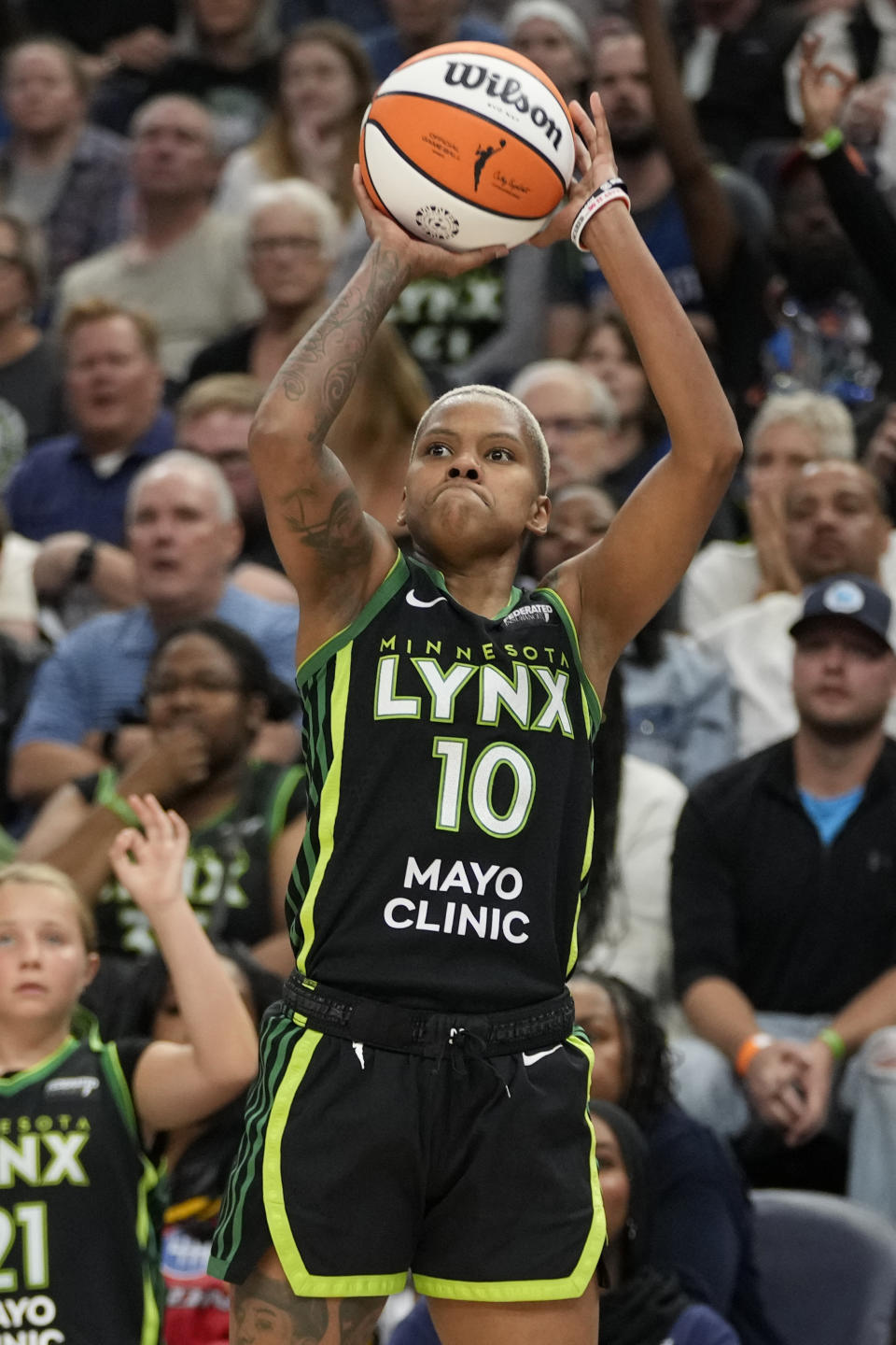 Minnesota Lynx guard Courtney Williams (10) shoots during the second half of Game 5 of a WNBA basketball semifinals against the Connecticut Sun, Tuesday, Oct. 8, 2024, in Minneapolis. (AP Photo/Abbie Parr)