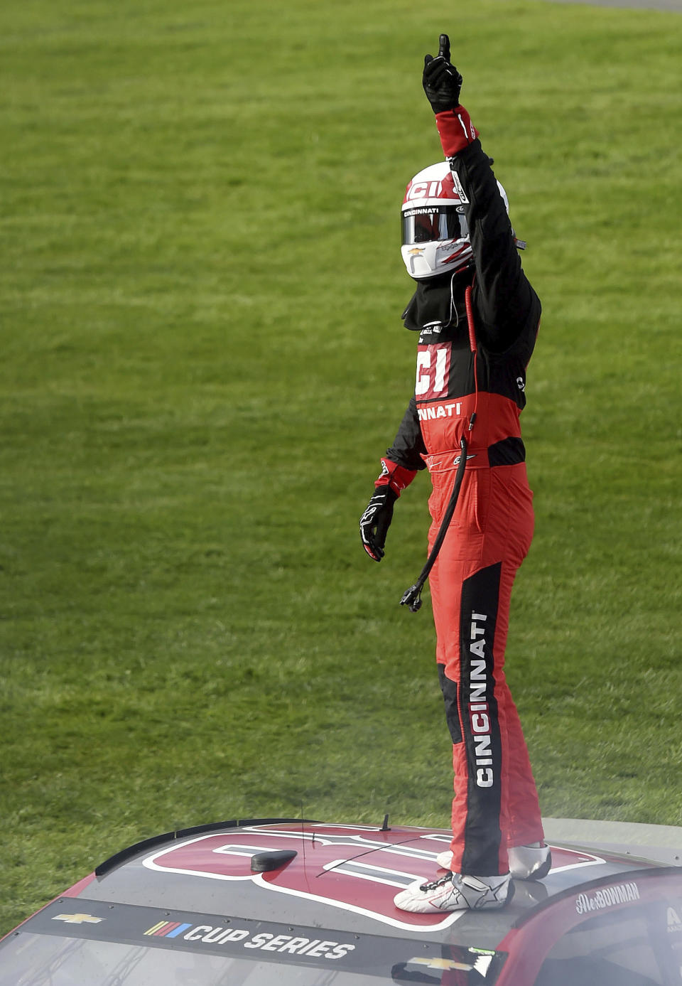 Alex Bowman celebrates on the roof of his race car after winning a NASCAR Cup Series auto race Sunday, March 1, 2020 in Fontana, Calif. (AP Photo/Will Lester)