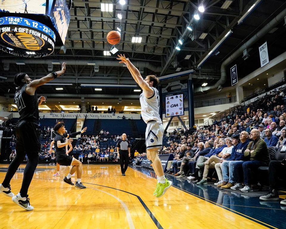 Monmouth's Jack Holmstrom connects on a 3-pointer against William & Mary on Feb. 8, 2024 in West Long Branch, N.J.