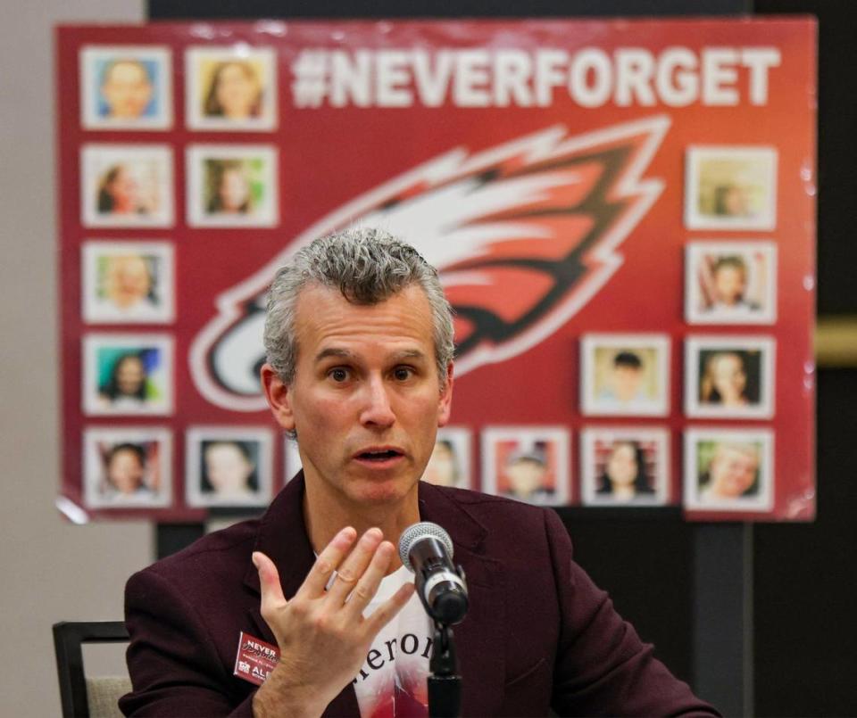 Max Schachter, left, gives his remarks as U.S. Secretary of Education Miguel Cardona, center, participated in a round table with parents of victims of the mass shooting by the invitation of U.S. Congressman Jared Moskowitz regarding school safety and mental health after visiting Marjory Stoneman Douglas High School on Monday, January 22, 2024, in Parkland, Florida.