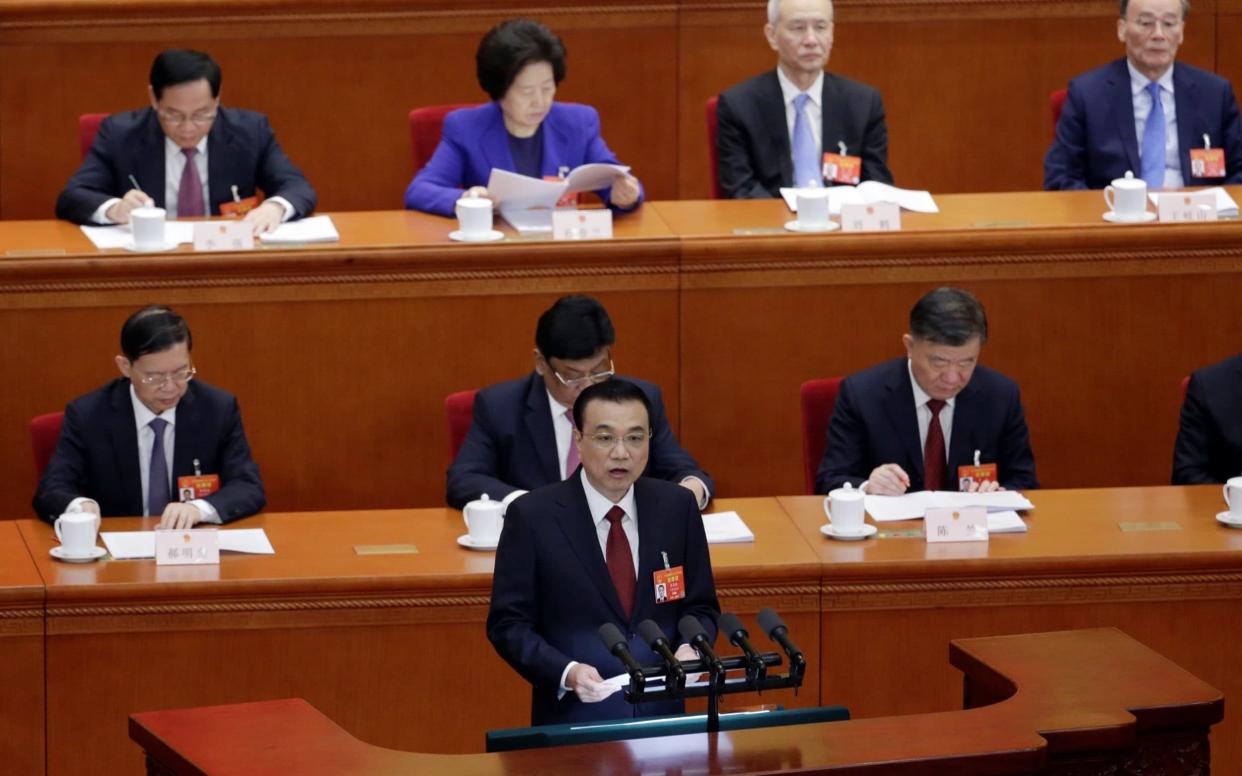 Chinese Premier Li Keqiang delivers the work report at the opening session of the National People's Congress - REUTERS