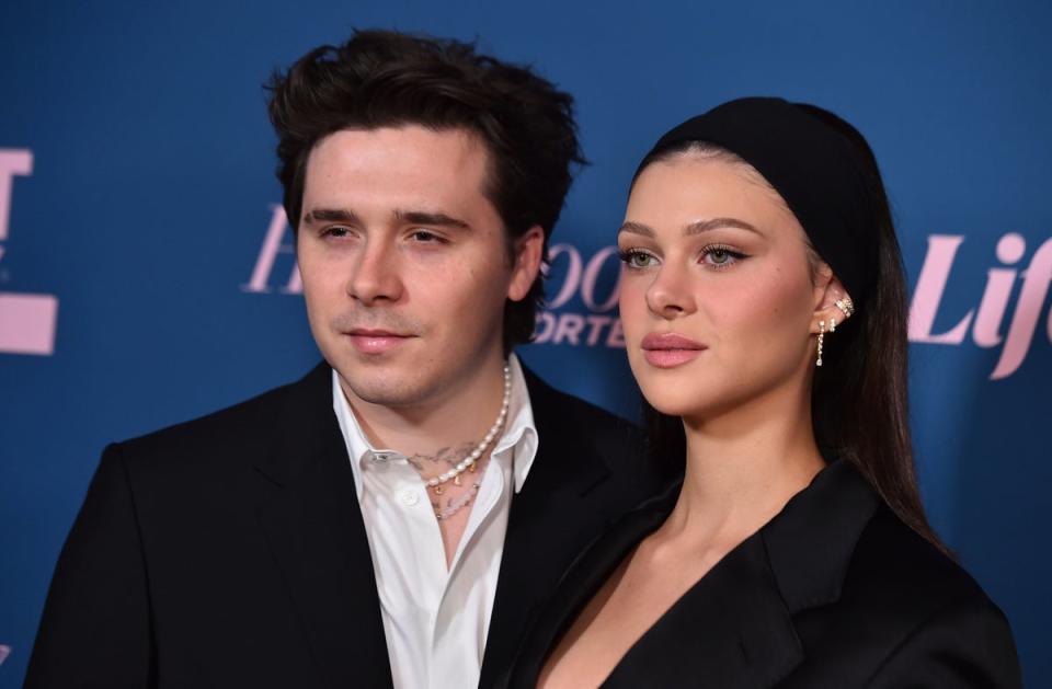 Nicola Peltz Beckham with Brooklyn at The Hollywood Reporter's Women in Entertainment Gala in December (Jordan Strauss/Invision/AP)