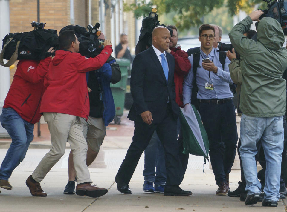 Atlantic City Mayor Frank Gilliam exits Federal Court in Camden, New Jersey, Thursday, October 3, 2019. Gilliam Jr. pleaded guilty in federal court in Camden, Thursday to wire fraud, admitting he defrauded a basketball club out of $87,000. (Jessica Griffin/The Philadelphia Inquirer via AP )