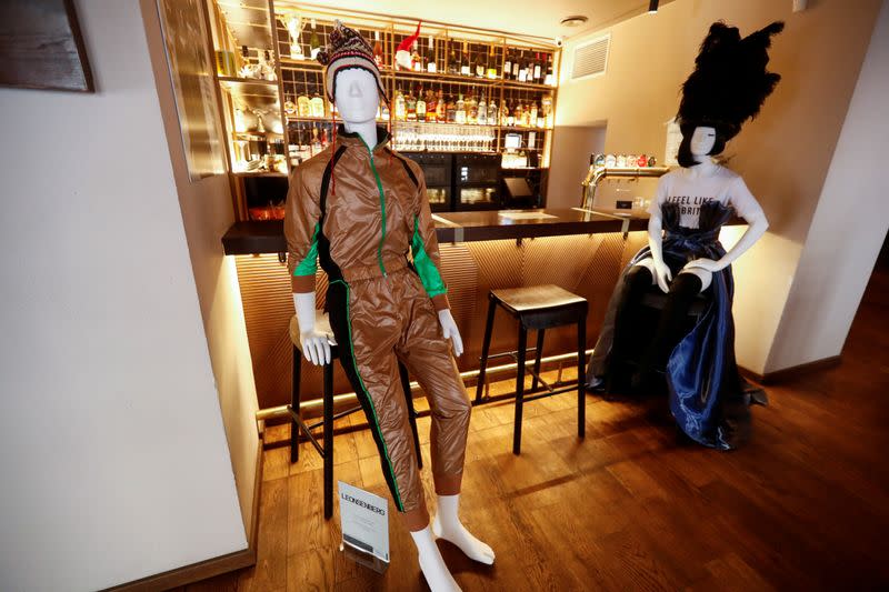 Mannequins dressed in creations of local designer sit at the bar in a restaurant during the coronavirus disease (COVID-19) outbreak in Vilnius