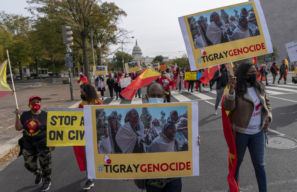 Exile Tigray community and their supporters march to mark a year since Ethiopia Prime Minister Abiy Ahmed's administration started fighting against the Tigray, the northernmost region in Ethiopia, at the U.S. Capitol, Thursday, Nov. 4, 2021, in Washington. (AP Photo/Gemunu Amarasinghe)