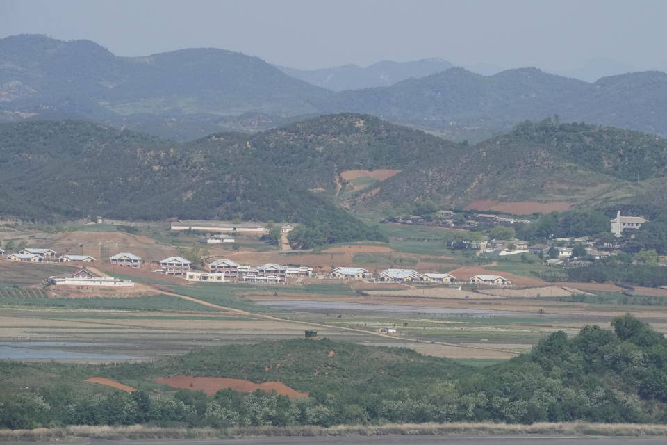 North Korea's Kaepoong town is seen from the unification observatory in Paju, South Korea, Friday, May 13, 2022. North Korea said Friday that six people died and 350,000 have been treated for a fever that has spread "explosively" across the nation, a day after its first acknowledgement of a COVID-19 outbreak. (AP Photo/Ahn Young-joon)