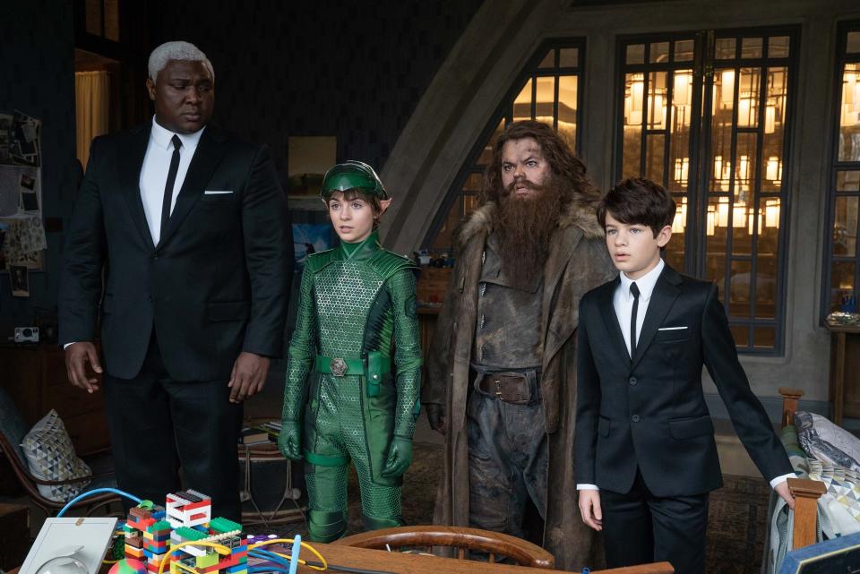 This image released by Disney Plus shows, from left, Nonso Anozie, Lara McDonnell, Josh Gad and Ferdia Shaw in a scene from "Artemis Fowl." (Disney via AP)