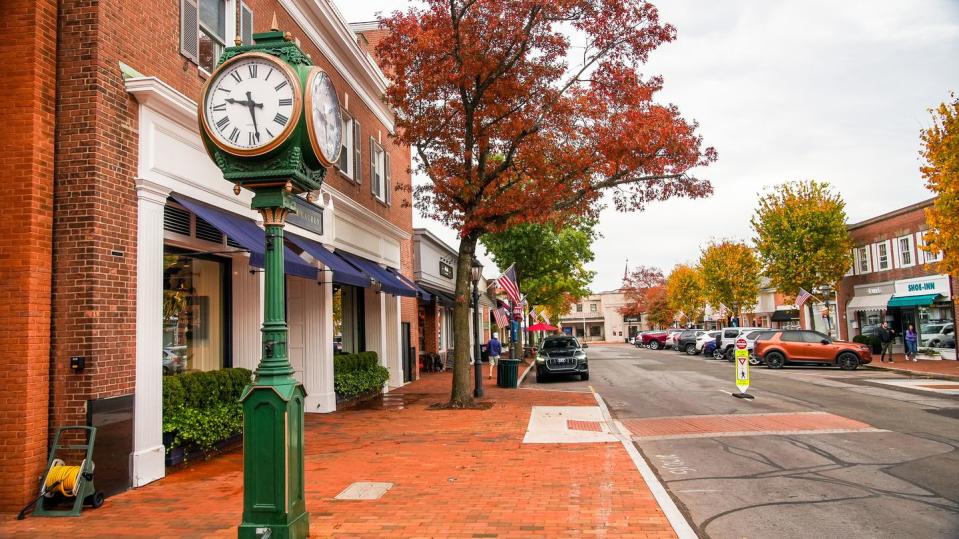 new canaan view from elm street in autumn morning with colored trees in october