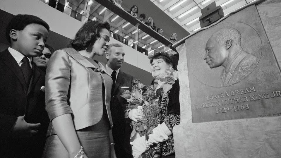 Coretta Scott King unveils a bas relief of her late husband at the Mugar Memorial Library on the Boston University campus. - Bettmann Archive/Getty Images