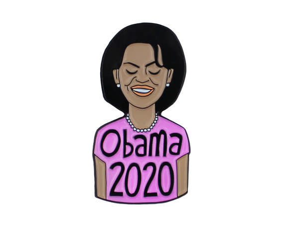 Buy the <a href="https://www.etsy.com/listing/501448283/michelle-obama-2020-enamel-lapel-pin?ga_order=most_relevant&amp;ga_search_type=all&amp;ga_view_type=gallery&amp;ga_search_query=michelle%20obama&amp;ref=sr_gallery_13" target="_blank">Sweet and Lovely "Michelle 2020" enamel pin</a>&nbsp;for $10