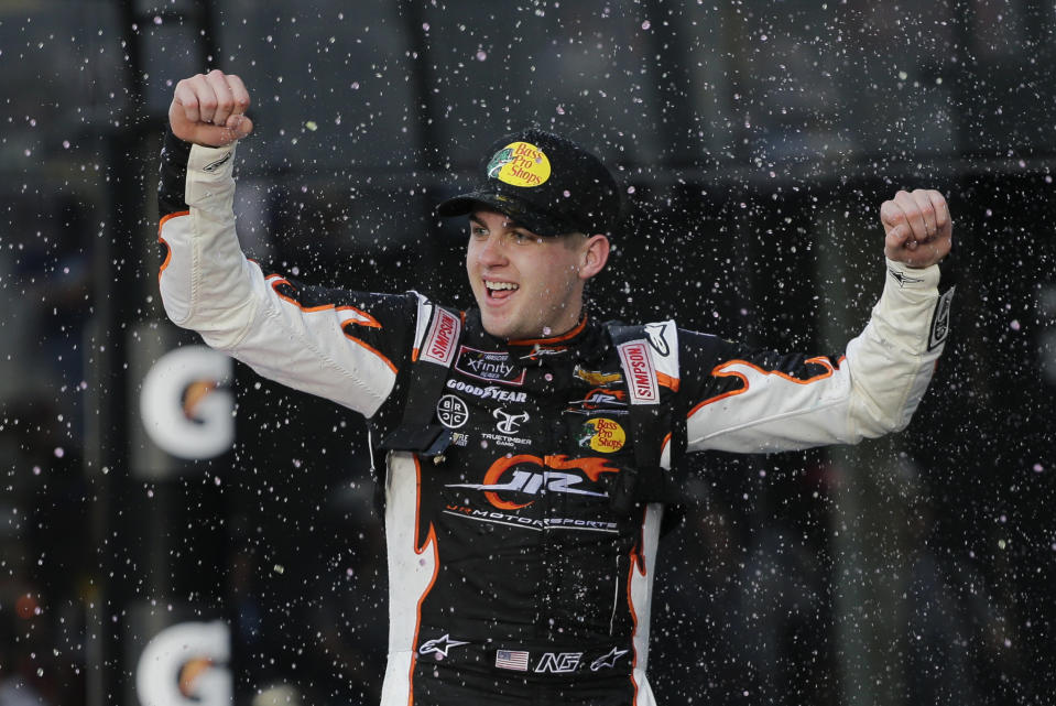 Noah Gragson celebrates in Victory Lane after winning the NASCAR Xfinity series auto race at Daytona International Speedway, Saturday, Feb. 15, 2020, in Daytona Beach, Fla. (AP Photo/Terry Renna)