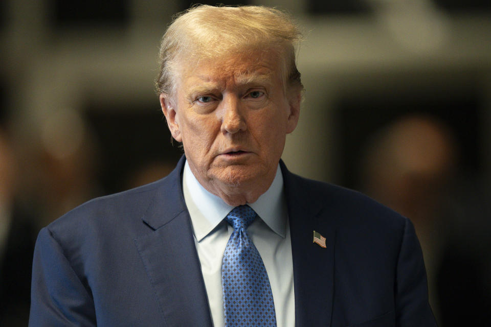 Former President Donald Trump speaks to reporters as he arrives for his trial at Manhattan Criminal Court, Thursday, May 9, 2024, in New York. (Steven Hirsch/New York Post via AP, Pool)