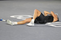 Garbiñe Muguruza, of Spain, reacts after defeating Anett Kontaveit, of Estonia, during the final match of the WTA Finals tennis tournament in Guadalajara, Mexico, Wednesday, Nov. 17, 2021. (AP Photo/Refugio Ruiz)