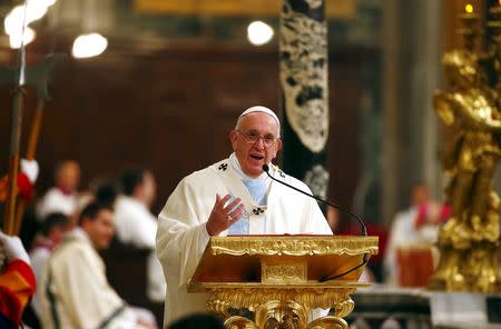 Pope Francis speaks during a mass at St. Mary Major's Basilica in Rome, Italy, January 1, 2016. REUTERS/ Tony Gentile