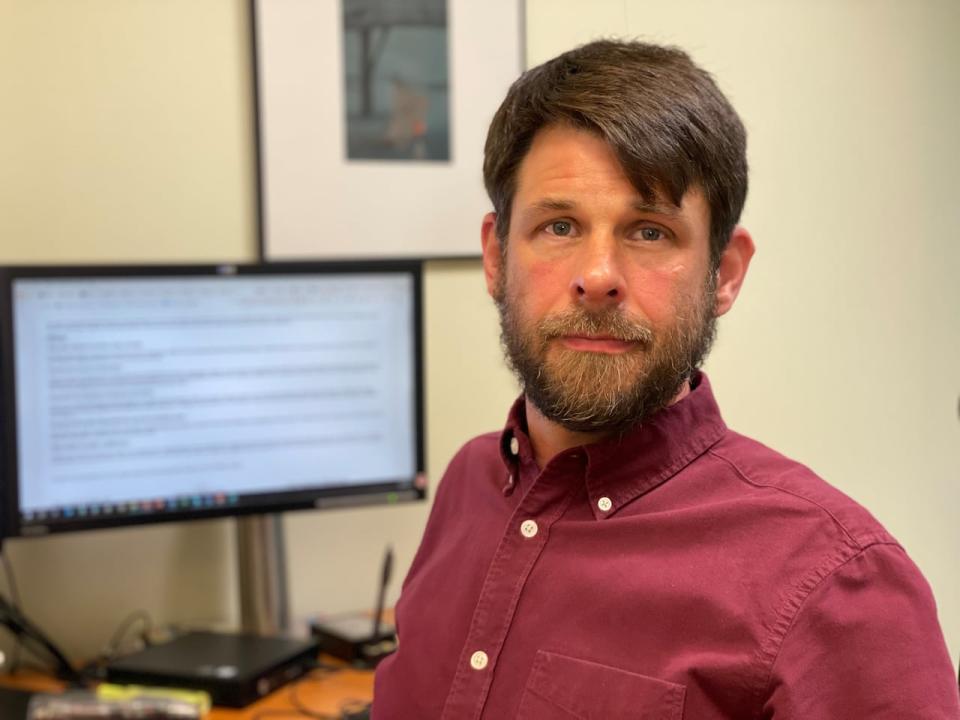 Matthew Johnson, director of education for Media Smarts, is seen in his Ottawa office on Wednesday, October 11, 2023.