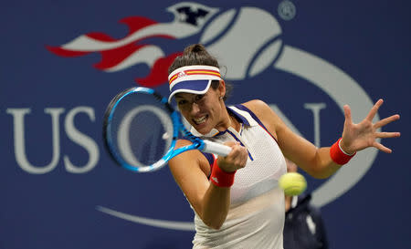 Tennis - US Open - New York, U.S. - September 3, 2017 - Garbine Muguruza of Spain in action against Petra Kvitova of the Czech Republic during their fourth round match. REUTERS/Ray Stubblebine