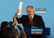 Britain's Prime Minister Boris Johnson gestures after speaking at a campaign event at the Queen Elizabeth II Centre in London, Friday, Dec. 13, 2019. Prime Minister Boris Johnson's Conservative Party has won a solid majority of seats in Britain's Parliament — a decisive outcome to a Brexit-dominated election that should allow Johnson to fulfill his plan to take the U.K. out of the European Union next month. (AP Photo/Frank Augstein)