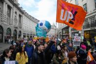 Workers take part in a strike, in London