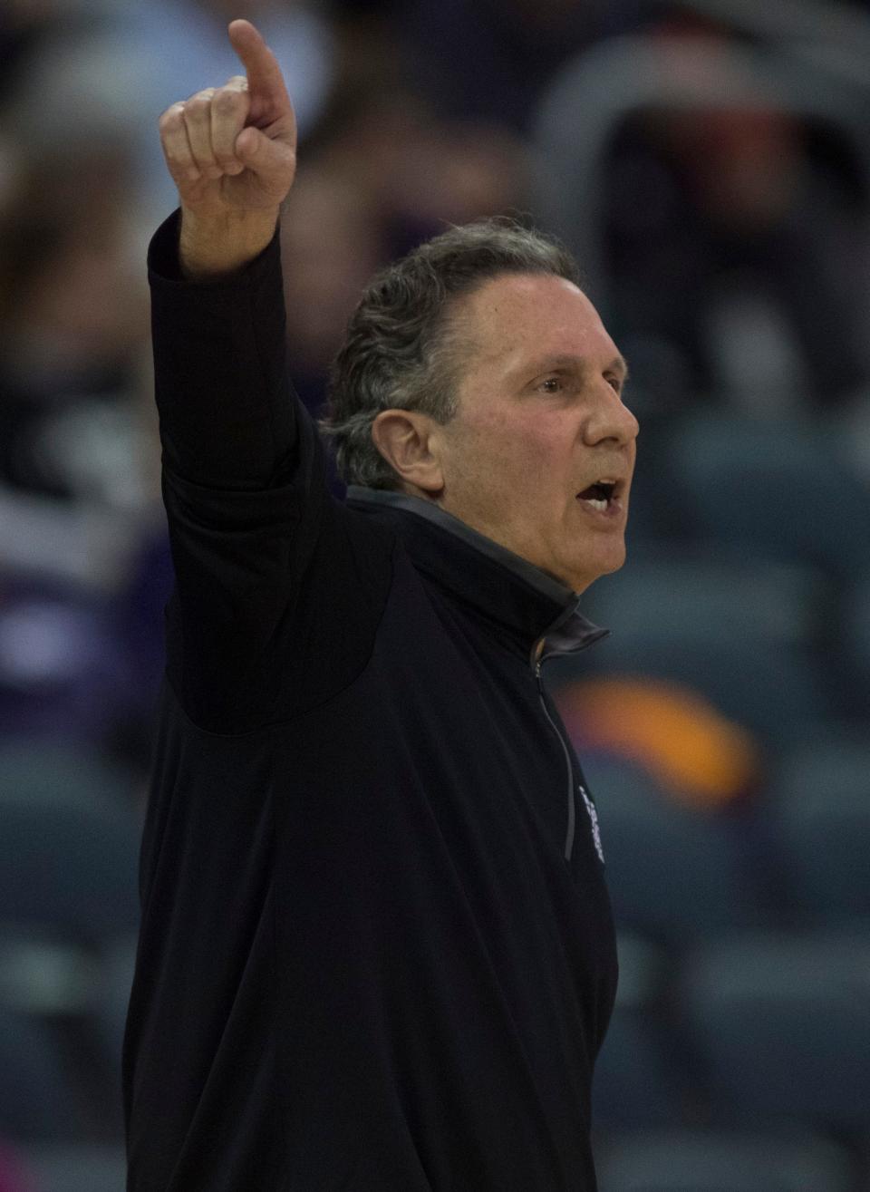 Evansville Head Coach Todd Lickliter calls a play as the University of Evansville Purple Aces take on the University of Northern Iowa Panthers at Ford Center in Evansville, Ind., Wednesday evening, Jan. 26, 2022. 