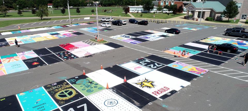 Painted Central Regional High school senior parking spaces are shown outside the Berkely Township school Friday afternoon, September 3, 2021.