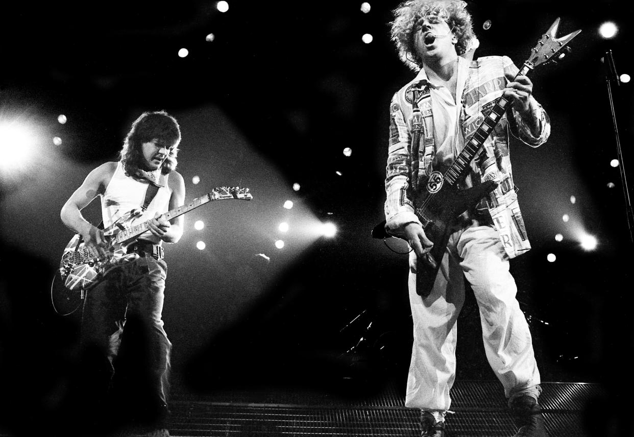 Van Halen superstar rock guitarist Eddie Van Halen, left, and vocalist Sammy Hagar performing before over 9,000 fans at sold-out Municipal Auditorium in Nashville on April 20, 1986.