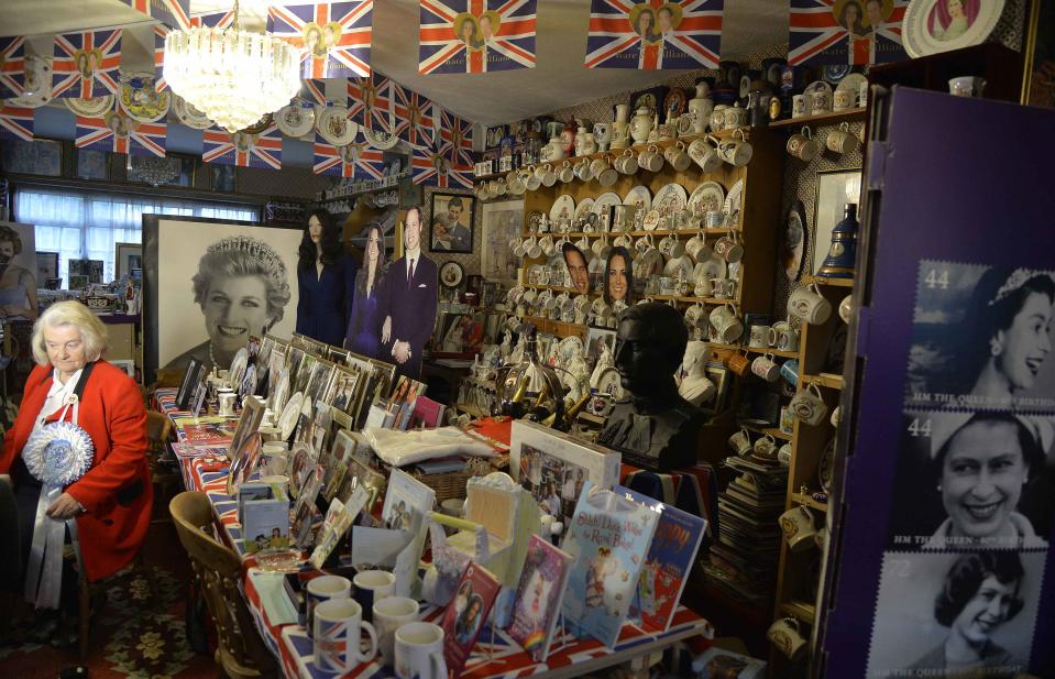 Margaret Tyler sits with royal paraphernalia at her house in west London