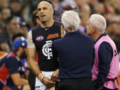 Chris Judd did not last long in his return to football before coming off injured