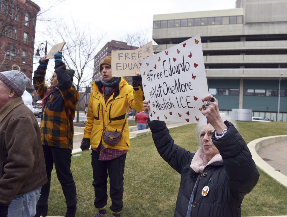 Supporters of immigrant rights Eduardo Samaniego gathered to present a petition with 9,000 signatures asking for his release to the U.S. Immigration and Customs Enforcement office Wednesday, Jan. 16, 2019, in Springfield, Mass. Samaniego, a 26-year old native of Mexico, had been a prominent voice at immigration rallies and marches in Massachusetts, is facing deportation. Supporters are rallying in cities across the country ahead of a Thursday, Jan. 17, hearing that may decide his fate. (Don Treeger/The Republican via AP)