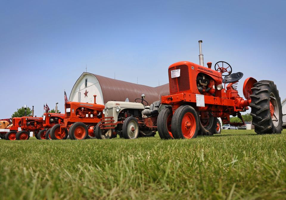 Antique tractors are lined up on display May 21, 2023, at the Farmer’s Antique Tractor & Engine Association's spring show.