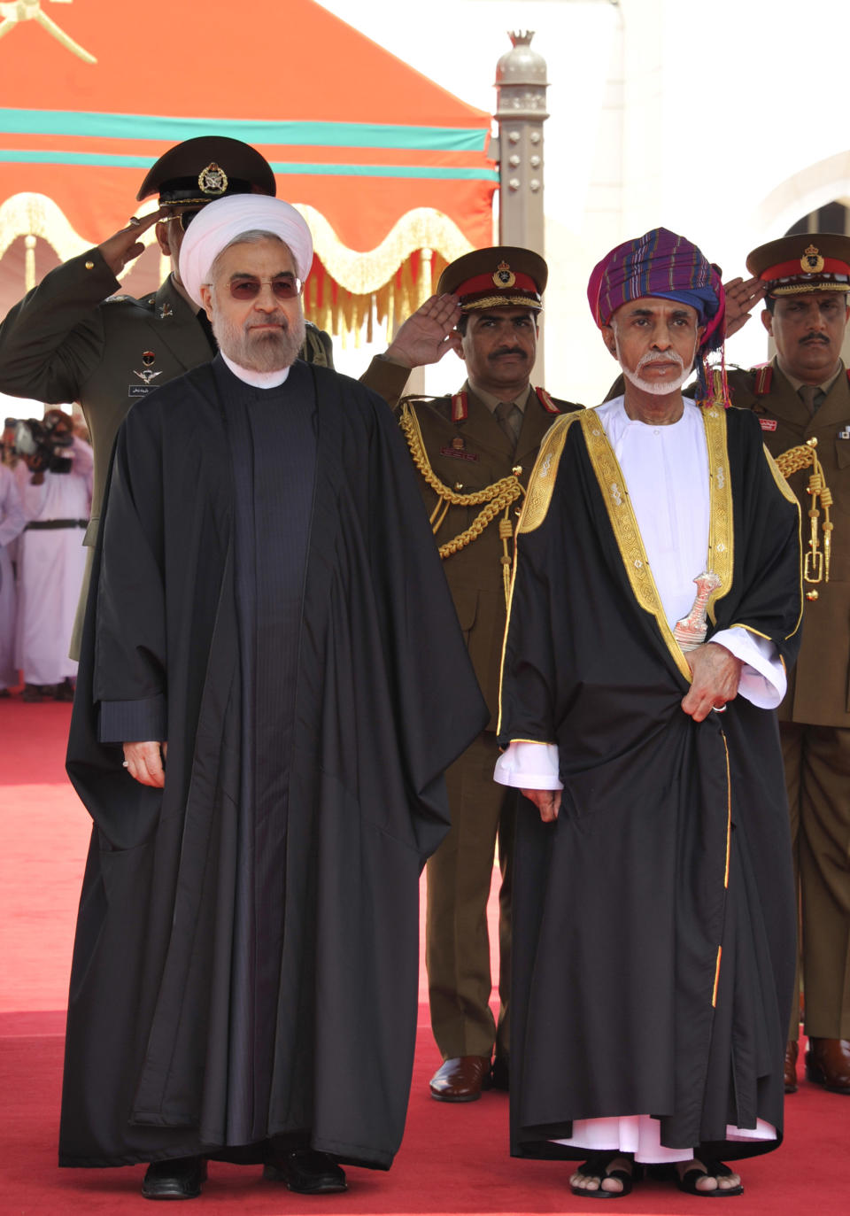 Sultan Qaboos, second right, receives Iranian president Hassan Rouhani at Al Alalam Palace in Muscat, Oman, Wednesday, March 12, 2014. Rouhani is in Oman for a two day visit. (AP Photo/Abo Zayed)