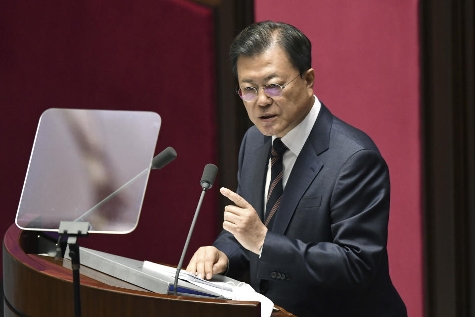 South Korea's President Moon Jae-in delivers a speech at the National Assembly in Seoul Monday, Oct. 25, 2021. Moon said Monday he’ll keep striving to promote peace with North Korea through dialogue until the end of his term next May, after Pyongyang raised animosities with a resumption of provocative weapons tests. (Jung Yeon-je/Pool Photo via AP)