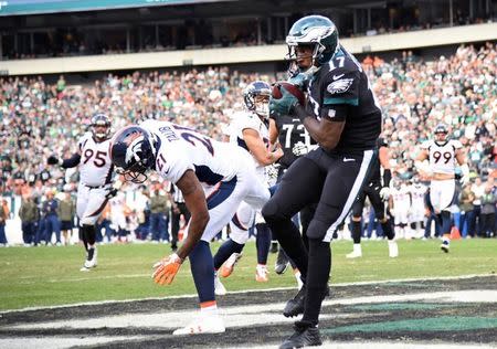 Nov 5, 2017; Philadelphia, PA, USA; Philadelphia Eagles wide receiver Alshon Jeffery (17) scores on a 4-yard touchdown catch against Denver Broncos cornerback Aqib Talib (21) during the third quarter at Lincoln Financial Field. Eric Hartline-USA TODAY Sports