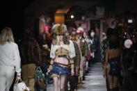 Models wear creations as part of the DSquared2 menswear Fall-Winter 2023-24 collection presented in Milan, Italy, Friday, Jan. 13, 2023. (AP Photo/Antonio Calanni)