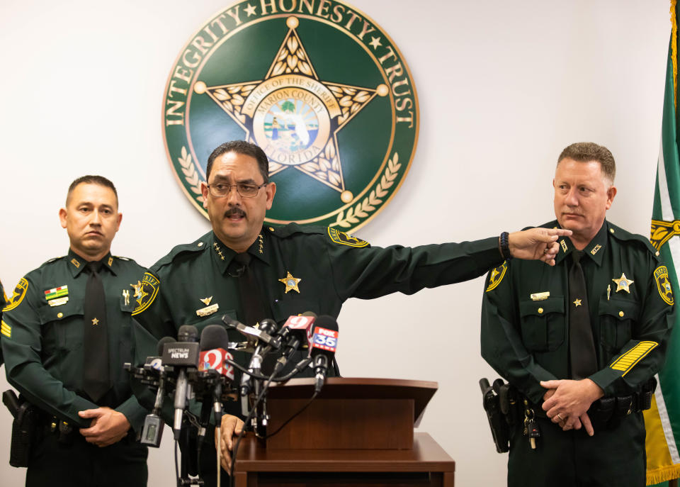 Sheriff Billy Woods at a press conference announcing arrests in the Ocklawaha triple homicide.