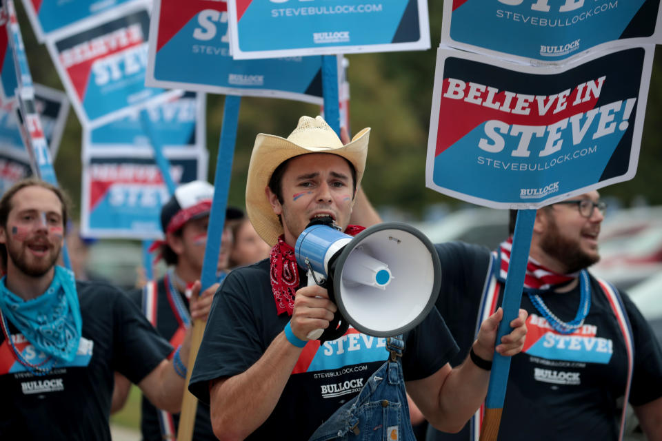 DES MOINES, IOWA - SEPTEMBER 21: Supporters of Democratic presidential candidate, Montana Gov. Steve Bullock attend the Polk County Democrats' Steak Fry on September 21, 2019 in Des Moines, Iowa. Seventeen of the 2020 Democratic presidential candidates and more than 12,000 of their supporters attended the event. (Photo by Scott Olson/Getty Images)