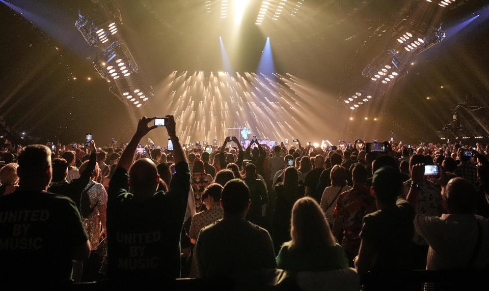 Eurovision fans watch the dress rehearsal for the first semifinal at the Eurovision Song Contest at the M&S Bank Arena in Liverpool, England, Monday, May 8, 2023. (AP Photo/Martin Meissner)