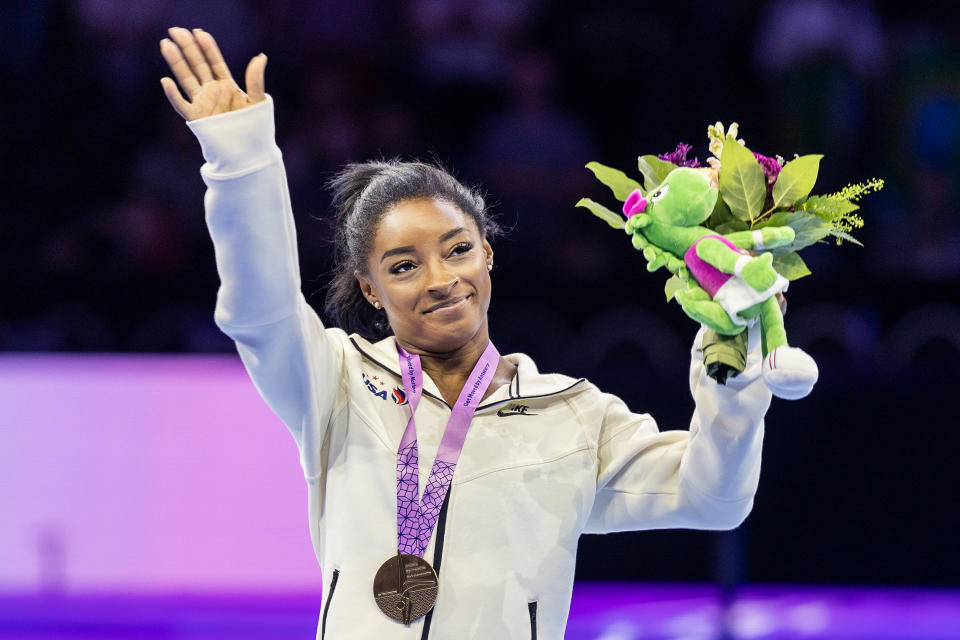 ANTWERP, BELGIUM - October 08:   Simone Biles of the United States on the podium with her gold medal after her victory in the Women's Balance Beam Final at the Artistic Gymnastics World Championships-Antwerp 2023 at the Antwerp Sportpaleis on October 8th, 2023 in Antwerp, Belgium. (Photo by Tim Clayton/Corbis via Getty Images)