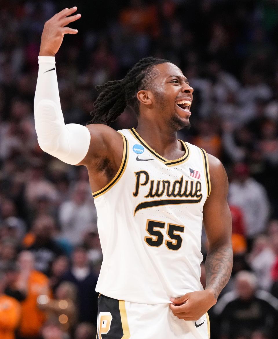 Purdue Boilermakers guard Lance Jones (55) yells in excitement Sunday, March 31, 2024, during the midwest regional championship at the Little Caesars Arena in Detroit.