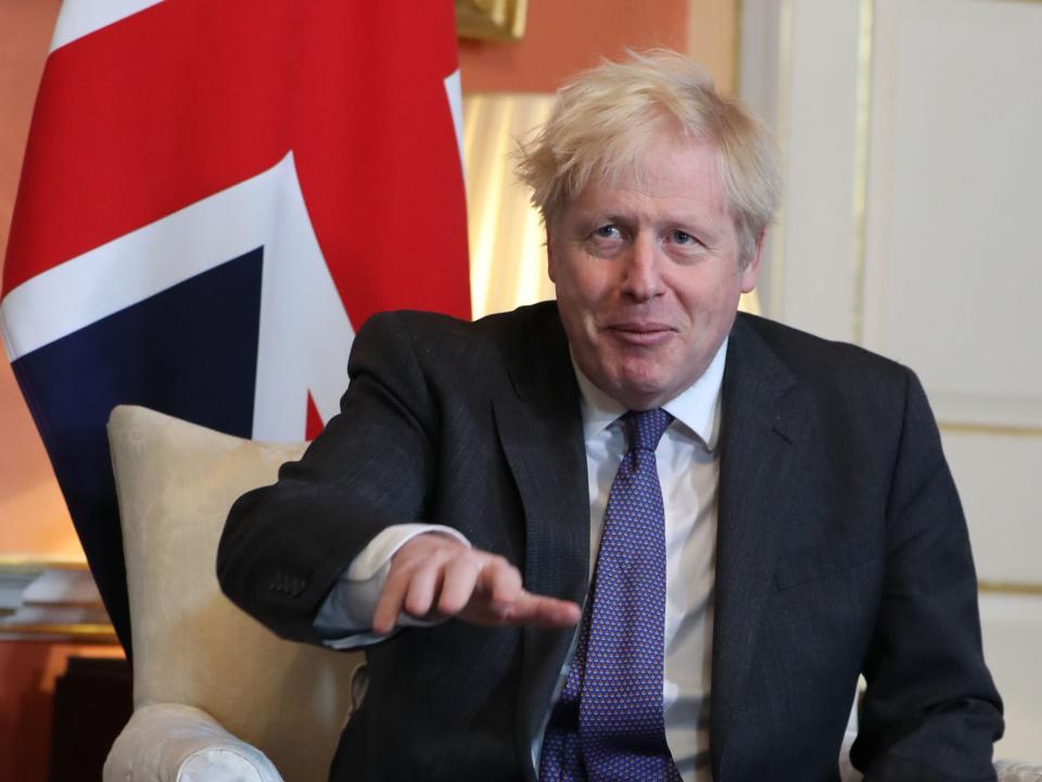 Boris Johnson sits in front of a Union flag inside 10 Downing Street (POOL/AFP via Getty Images)