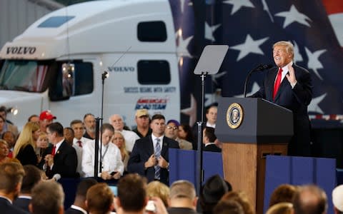 President Donald Trump speaks about tax reform during an event at the Harrisburg International Airport - Credit: AP